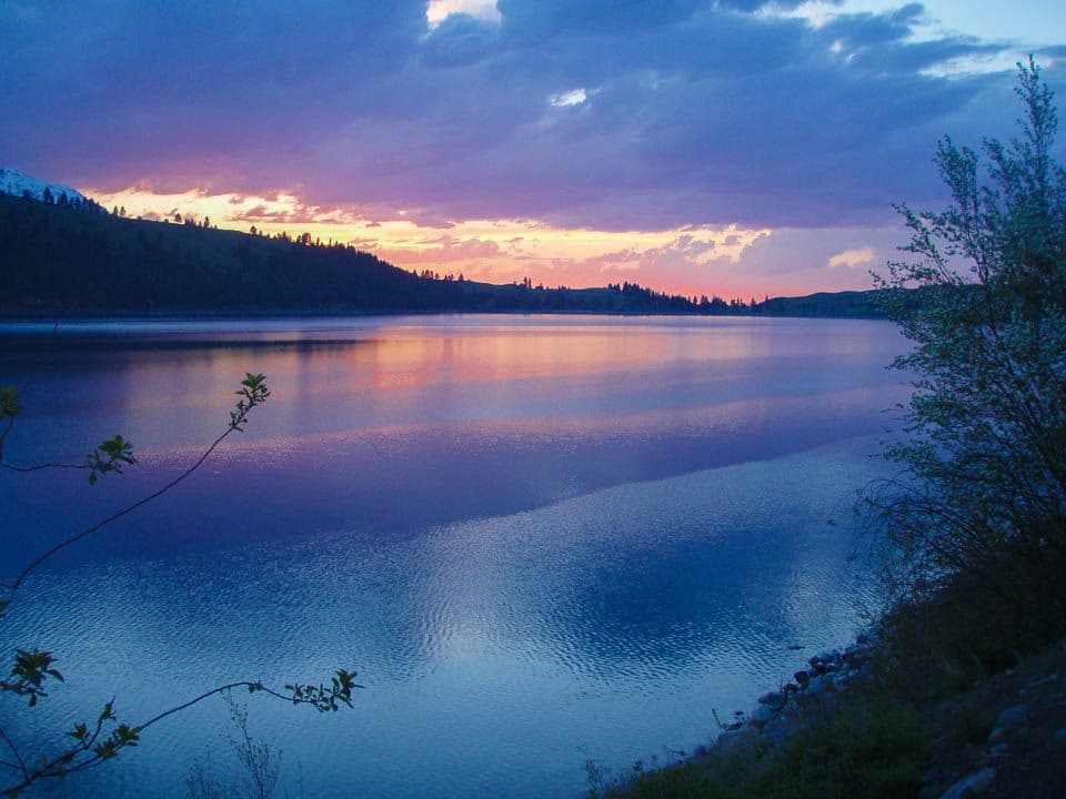 Wallowa Lake at sunset. Purple, blue and pink skies