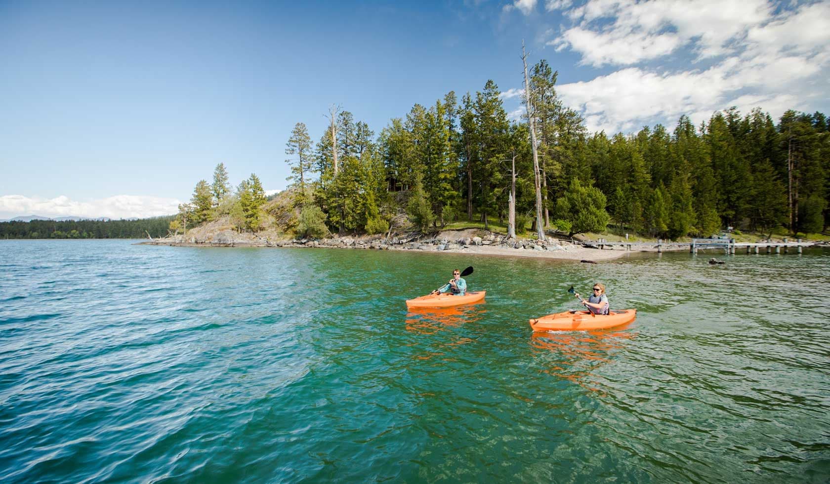 Kayakers on Flathead Lake turquoise waters
