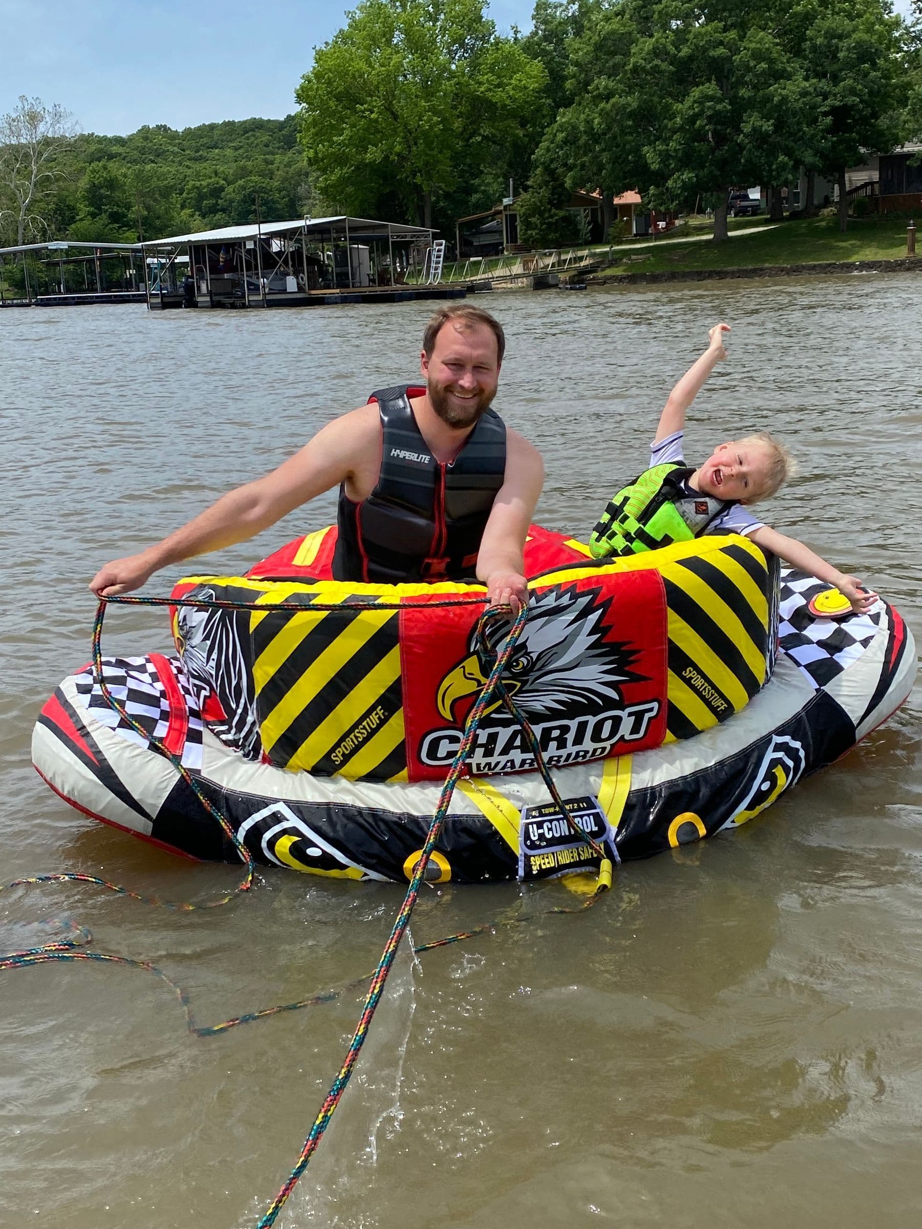 Dad and Son having fun tubing