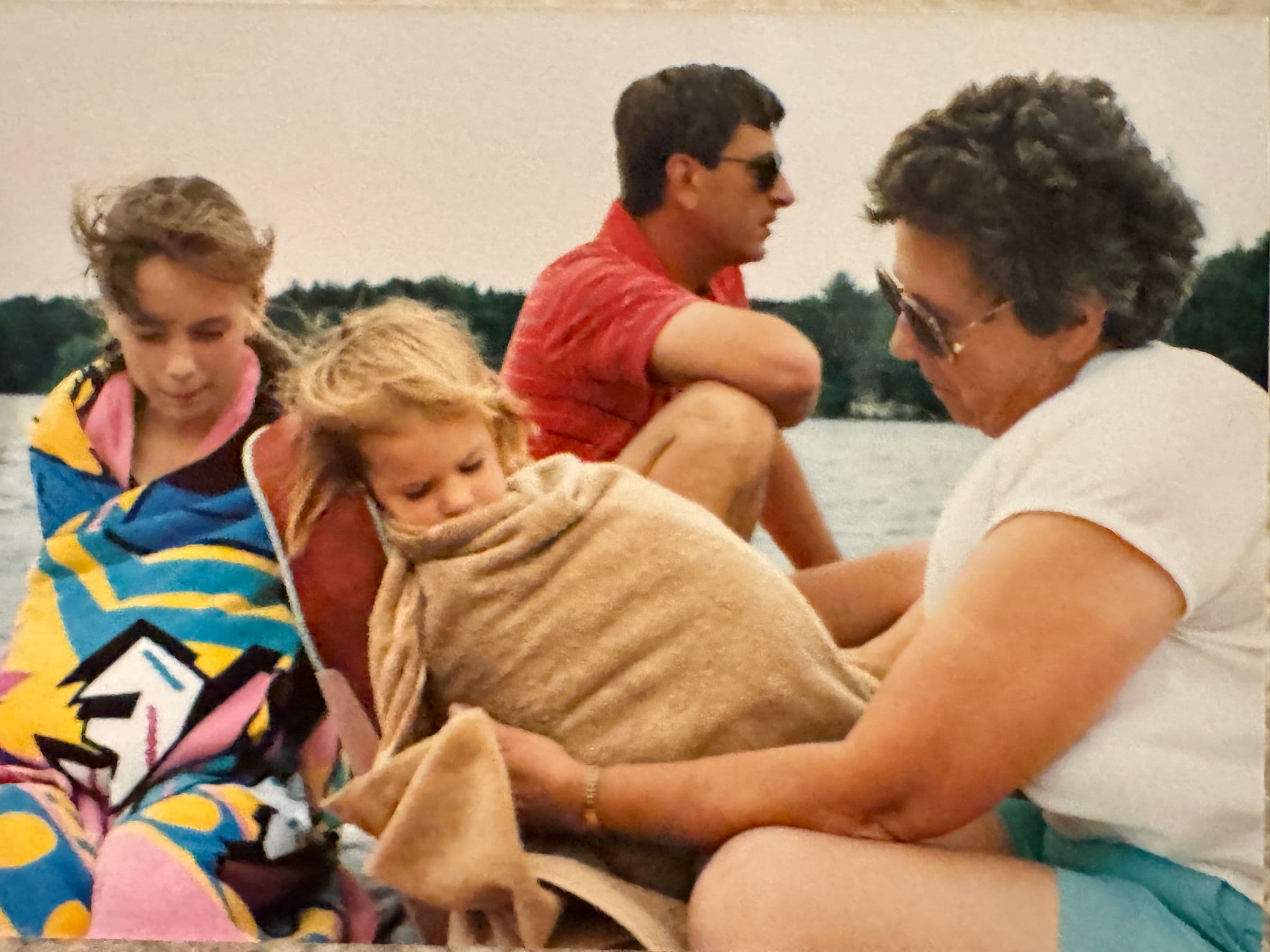 Little Girl sleeping on boat with Grandma