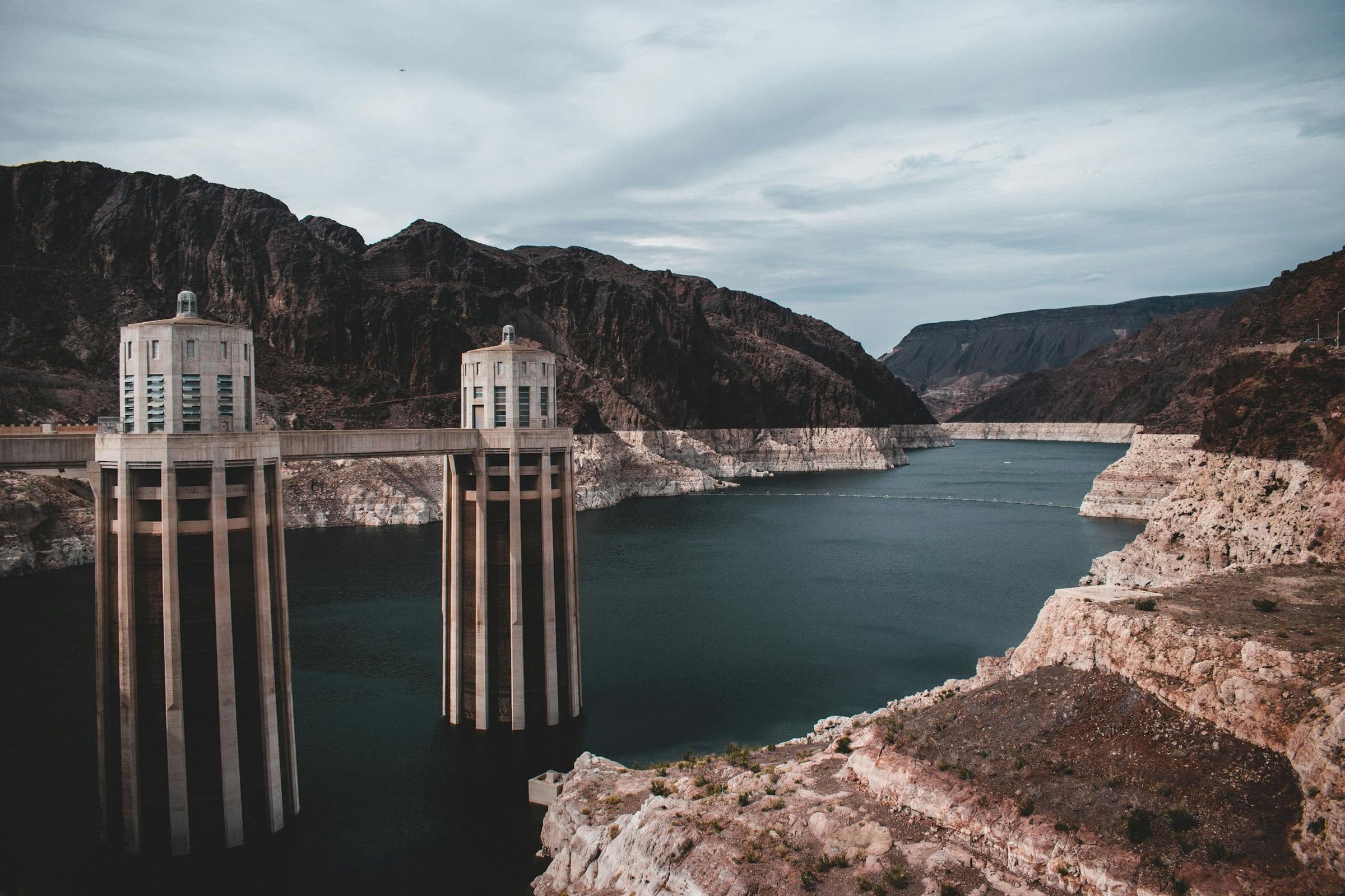 Stunning aerial shot of Hoover Dam and Lake Mead in the United States with dramatic landscape.