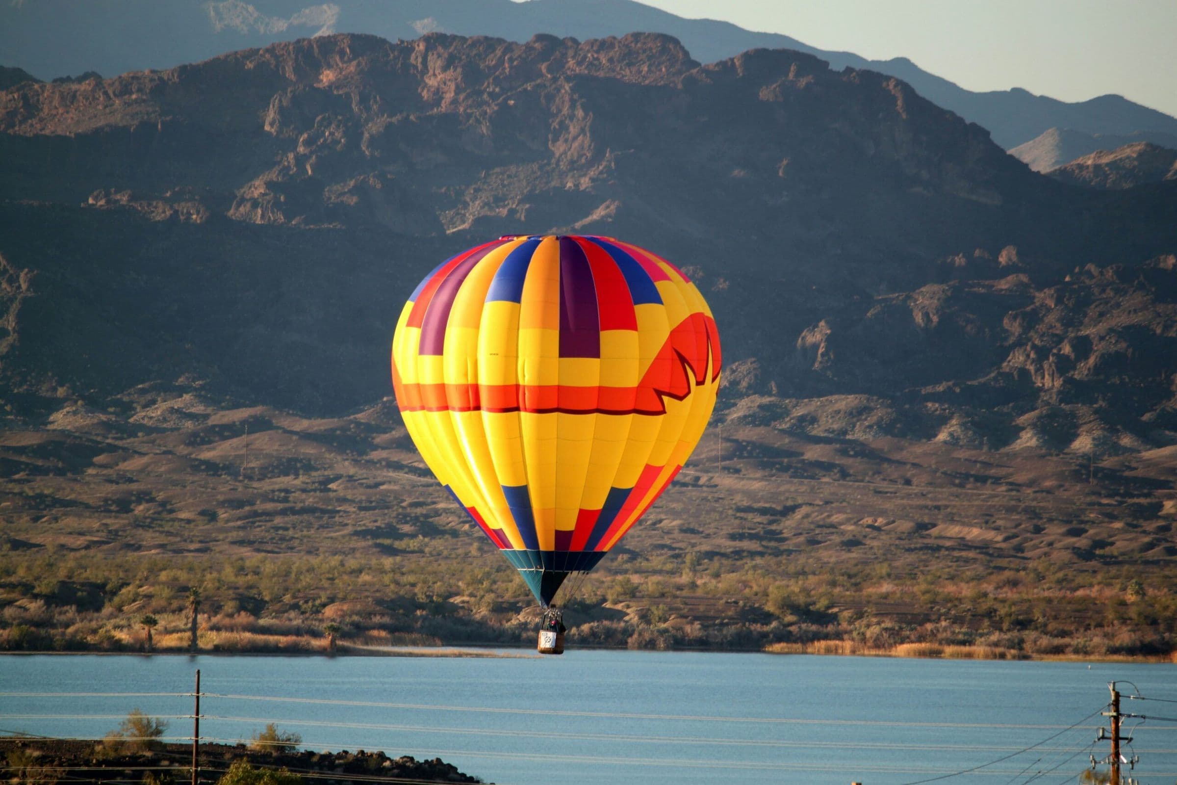 Lake Havasu with a hot air balloon flying above