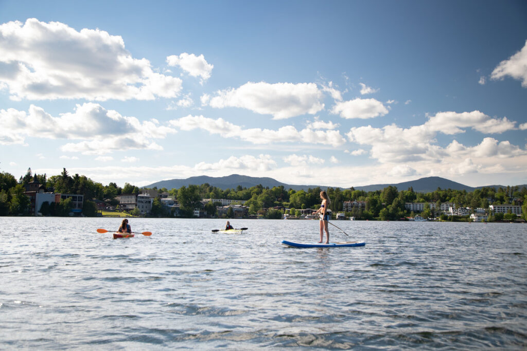 Paddle boarding and kayakers at Mirror Lake